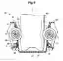 Fig. 10 - Container holder including a swing member rotatably supporting a roller to hold a container received therein