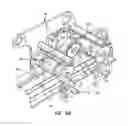 Fig. 10 - Belt operated container handling system for side loader