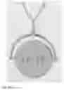 Fig. 22 - Code Charm Containing Cryptic Message Only Readable When Spun
