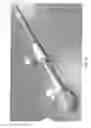 Fig. 22 - Catheter-based delivery system for delivering a leadless pacemaker and employing a locking hub