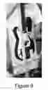 Fig. 10 - Positioning apparatus for stringed musical instruments