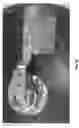Fig. 59 - Gauge wheel and universal scraper for use with a conventional row planter assembly