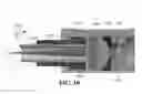 Fig. 08 - MAGNETO-OPTICAL DEFECT CENTER SENSOR INCLUDING LIGHT PIPE WITH FOCUSING LENS