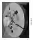 Fig. 32 - Hybrid holding device