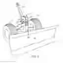 Fig. 06 - Manually operable carriage and working attachments that may be employed with the carriage