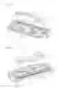 Fig. 25 - Razor cartridge having a blade housing with slits receiving clips for securing razor blades