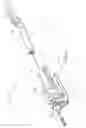 Fig. 03 - Surgical system including a powered tool and a steering tool having inelastic and elastic cables to be tensioned to impart a bend and resist side or radial loading