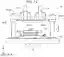 Fig. 12 - Injection molding apparatus