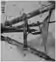 Fig. 22 - Modular firearm support, concealment aid, and shooting equipment holder assembly for a multi-legged stand