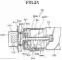 Fig. 35 - Nozzle receiver for use with a toner container