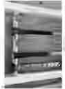 Fig. 43 - Shed organizing systems including self-leveling mounting plates and tool supporting sections