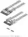 Fig. 44 - Electrical connector assembly including a rear insulative body having upper and lower wire receiving slots and a pair of metallic shields having engagement tabs