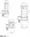 Fig. 13 - Stock lifter assembly