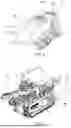 Fig. 04 - ROAD CONSTRUCTION VEHICLE WITH MATERIAL HOPPER WITH PIVOT FUNCTION